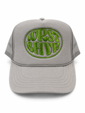 Grey Trukas WRST BHVR trucker hat with olive embroidered logo, foam front, mesh back, made in LA