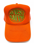 Orange Trukas WRST BHVR trucker hat with olive embroidered logo, foam front, mesh back, made in LA